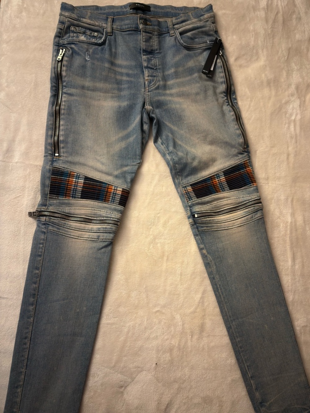 AMIRI Light Blue Skinny Jeans with Multicolor Knit Knee Panels